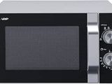 un four à micro-ondes noir et argenté sur fond blanc