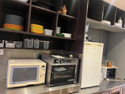 a kitchen with a microwave, oven, dishwasher, and dishwasher in it