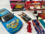many different types of toy cars on the table