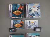 many video games that are on the table next to each other