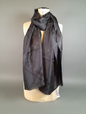 the black scarf is on a mannequin mannequin mannequin mannequin mannequin mannequin mannequin mannequin manne