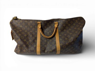 LOUIS VUITTON Sac de voyage modèle "Speedy 60" en toile mono…