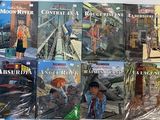 un grand nombre de livres posés sur une table