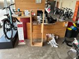 a bike shop with a lot of bikes in it