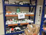 many boxes of electronic equipment on the shelves in the room