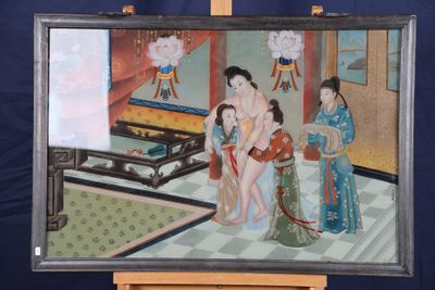 un tableau posé sur un chevalet représentant une femme et deux enfants
