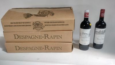 three bottles of wine sitting next to each other on a table