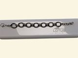 a silver bracelet that has a lot of links on it