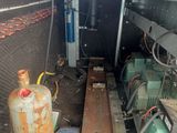 a tank of water sitting in the back of a truck