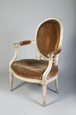 an image of a chair with a brown leather seat on a white background