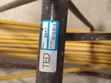 a close up of a pipe with a sticker on it