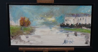 a painting on a easel with a painting of a river