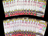 plusieurs paquets de cartes à collectionner Pokémon sur fond noir
