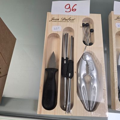 two boxes with different kitchen utensils in them