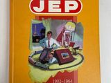 the cover of a book with a picture of a man sitting on a table