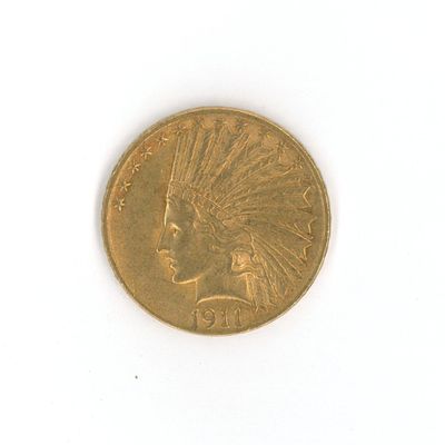 une pièce d'or sur laquelle est représentée une tête d'Indien
