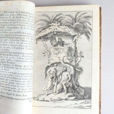 un livre ouvert sur lequel est dessiné un homme perché dans un arbre