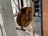 a close up of a door with a pulley attached to it