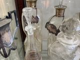a glass display case with a lot of glass items on it
