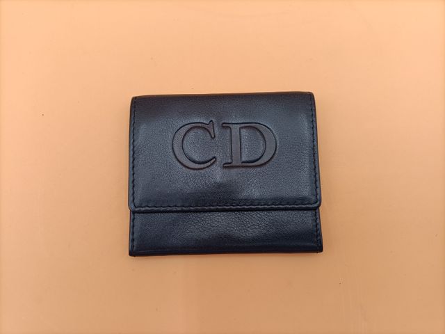 Christian DIOR - Porte-monnaie cuir bleu marine. État neuf