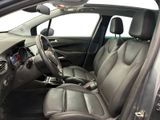 the interior of a car with the front seats down and the steering wheel down