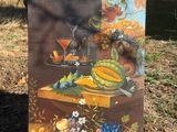 a picture of a painting of fruit and flowers on a table