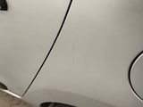 a close up of a car ' s door handle and the door handle is missing