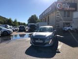 a car parked in front of a car wash station