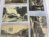 four old postcards on a table with a picture of a train