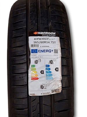 a close up of a tire with a sticker on it