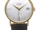 a close up of a wrist watch with a white dial