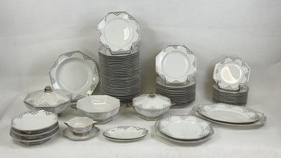 a lot of plates that are sitting on a table