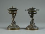 pair of antique silver plated candlesticks with cherensh and cherensh