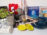 a table with a variety of cooking utensils on it