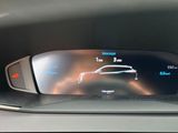 the dashboard of a car with a digital display on it