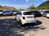 many cars parked in a parking lot in a parking lot