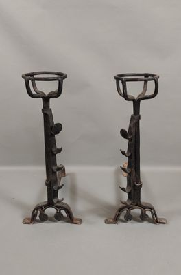two candles that are sitting on top of each other