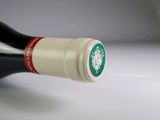 a bottle of wine that is sitting on a table