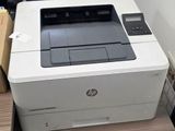 a printer that is sitting on top of a desk