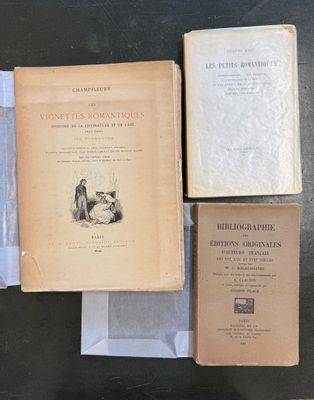 three books are sitting on a table next to each other