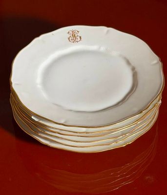 five plates stacked on top of each other on a table