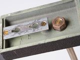 a metal object with a nut and a nut on it