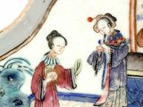 a plate with a picture of a woman and a man