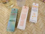 three different types of creams sitting on a table