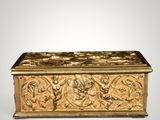 an image of a gold box with a design on it