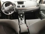 the interior of a car with a steering wheel, dashboard, and dashboard controls