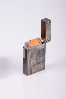 two lighters sitting next to each other on a white surface