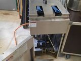 an image of a commercial fryer in a commercial kitchen