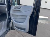 a white truck with its door open and the driver ' s door open