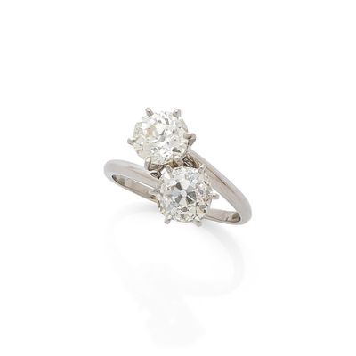 a diamond three - stone ring, by van cleef